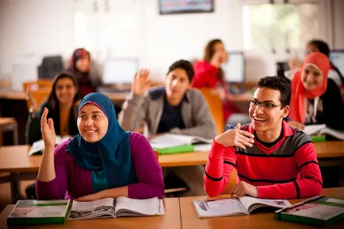 Students learning English together